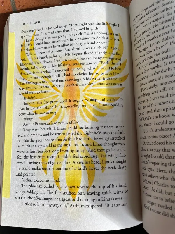 Soft ink-blended stencil of a yellow/gold/orangey phoenix during a relevant passage of the book